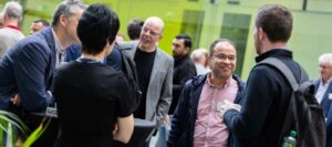 Alumni chatting at Tyndall DTIF event